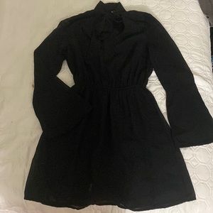 Casual yet formal black romper!